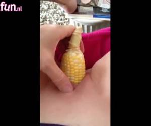 Slowly, the corn on the cob in her bald pussy in slip and masturbate while she is movieing whiteh her mobile.mastubate whiteh a corn on the cob